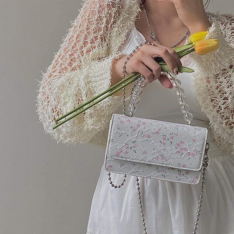 White Tanuki Floral Rain Shoulder Bag