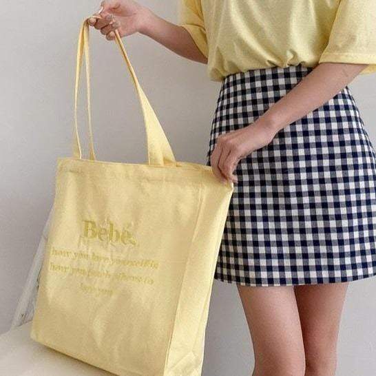 White Tanuki Pastel Yellow Bebe Tote Bag
