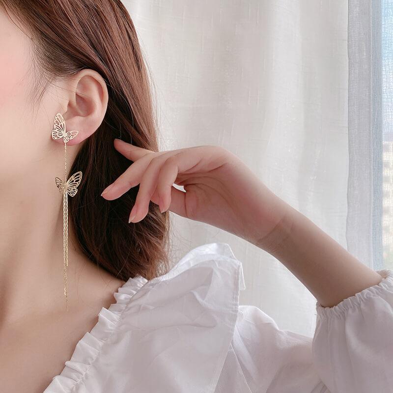 White Tanuki Catching Butterfly Earrings