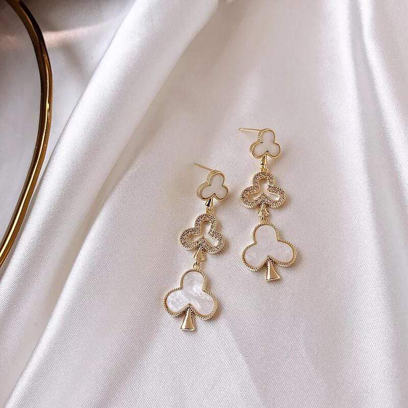 White Tanuki Ivory Clover Earrings