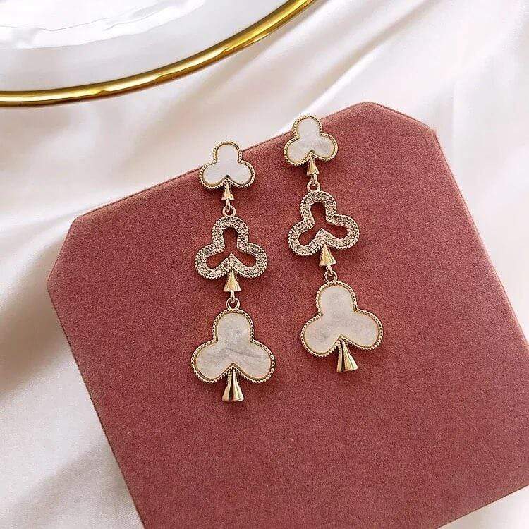 White Tanuki Ivory Clover Earrings